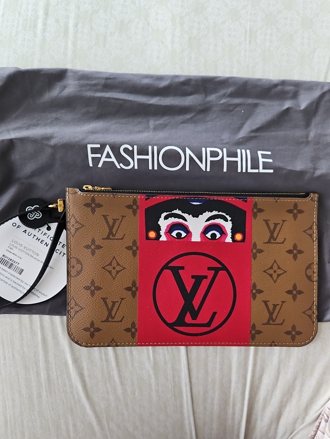 Authentic Louis Vuitton Neverfull Pochette - Reverse Monogram Kabuki Pouchette